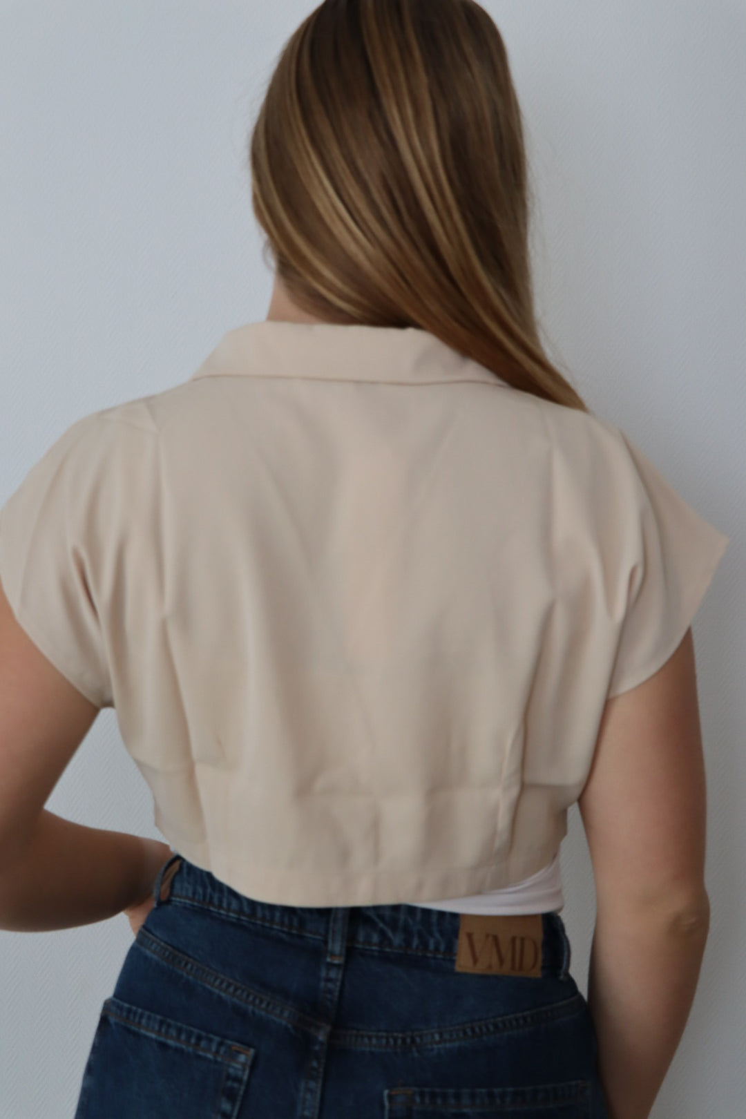 Mouwloze blazer top met enkele knoopsluiting Beige