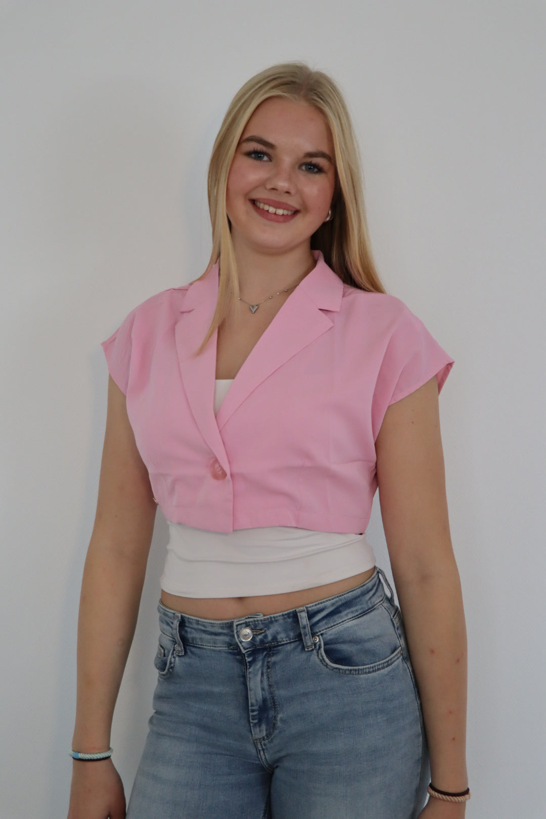 Mouwloze blazer top met enkele knoopsluiting Roze