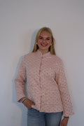 Roze jasje met geborduurd patroon